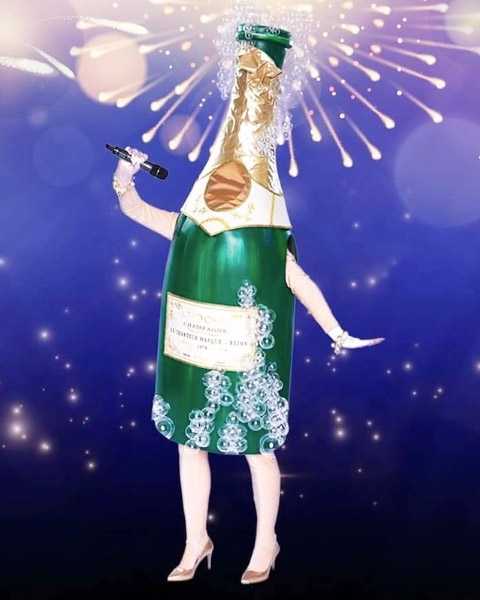 Edsilia Rombley champagne fles bottle costume maker Masked Singer