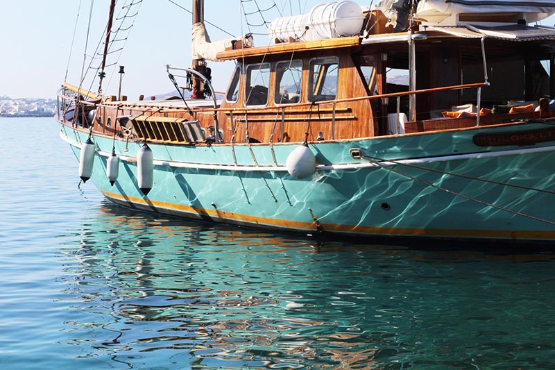 Mykonos Delos turquoise greek wooden boat photo by Mike Petty